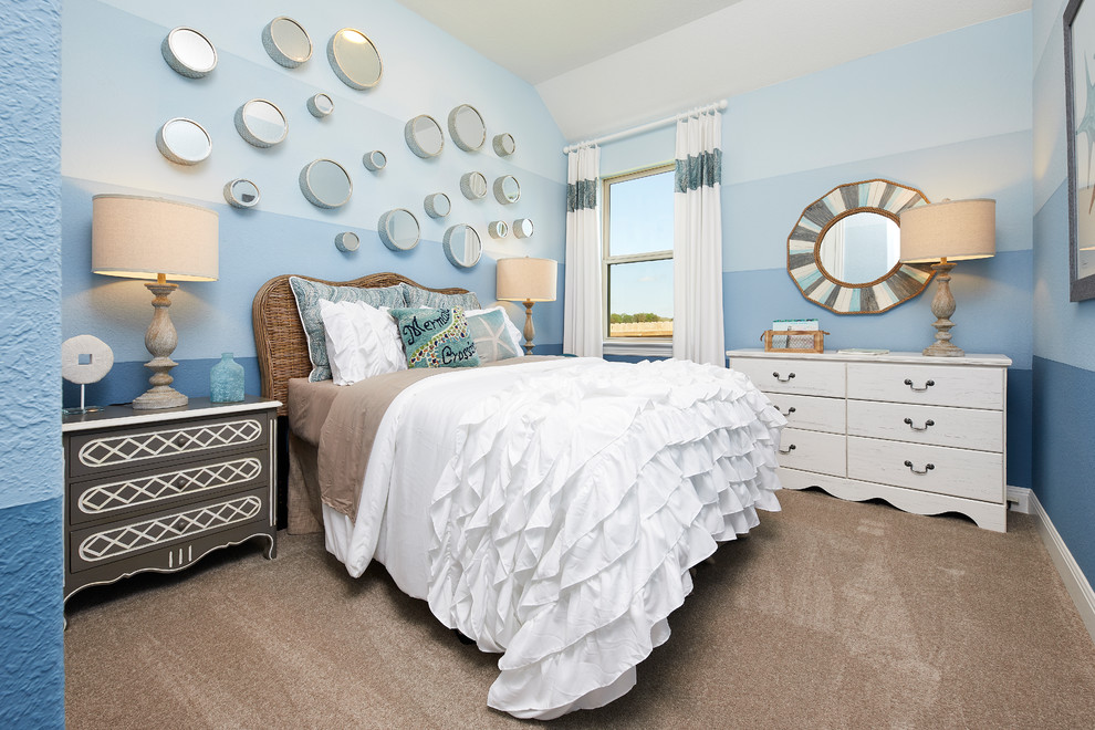 Mid-sized transitional guest bedroom in Austin with blue walls, carpet and beige floor.