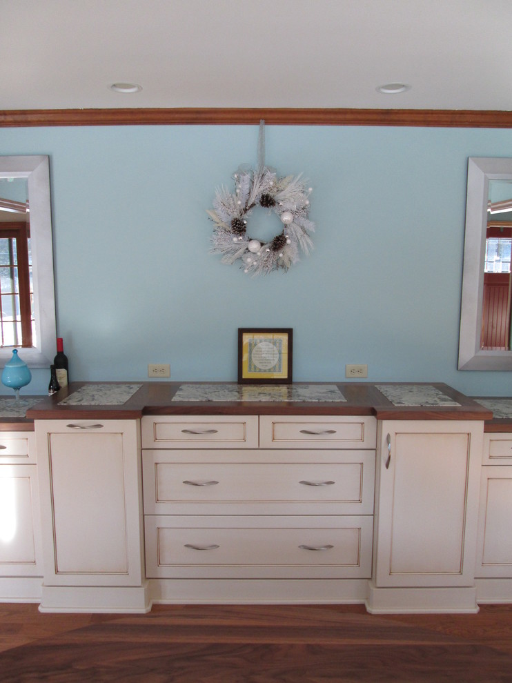 Kitchen/dining room combo - mid-sized transitional light wood floor kitchen/dining room combo idea with blue walls and no fireplace