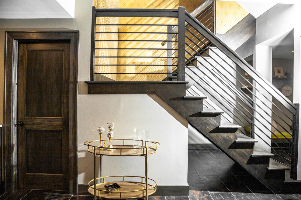 Underground ceramic tile and brown floor basement photo in Indianapolis with gray walls