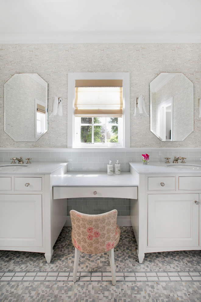 Inspiration for a large beach style master bathroom in New York with an undermount sink, beaded inset cabinets, white cabinets, marble benchtops, gray tile, subway tile, mosaic tile floors and multi-coloured walls.