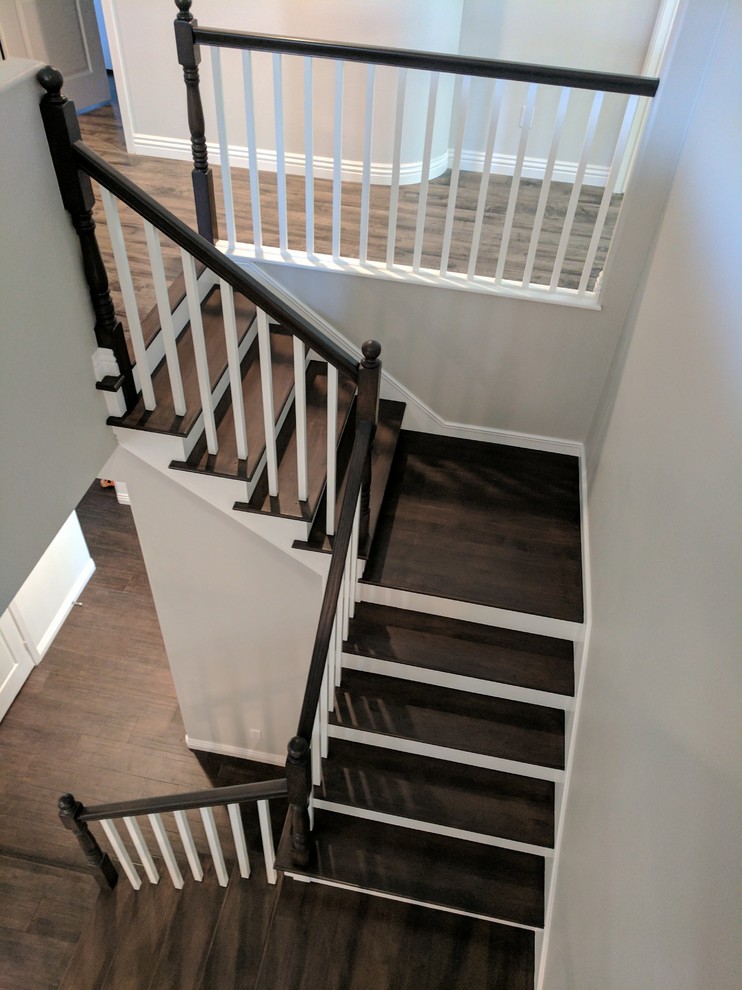 Example of a transitional staircase design in Orange County