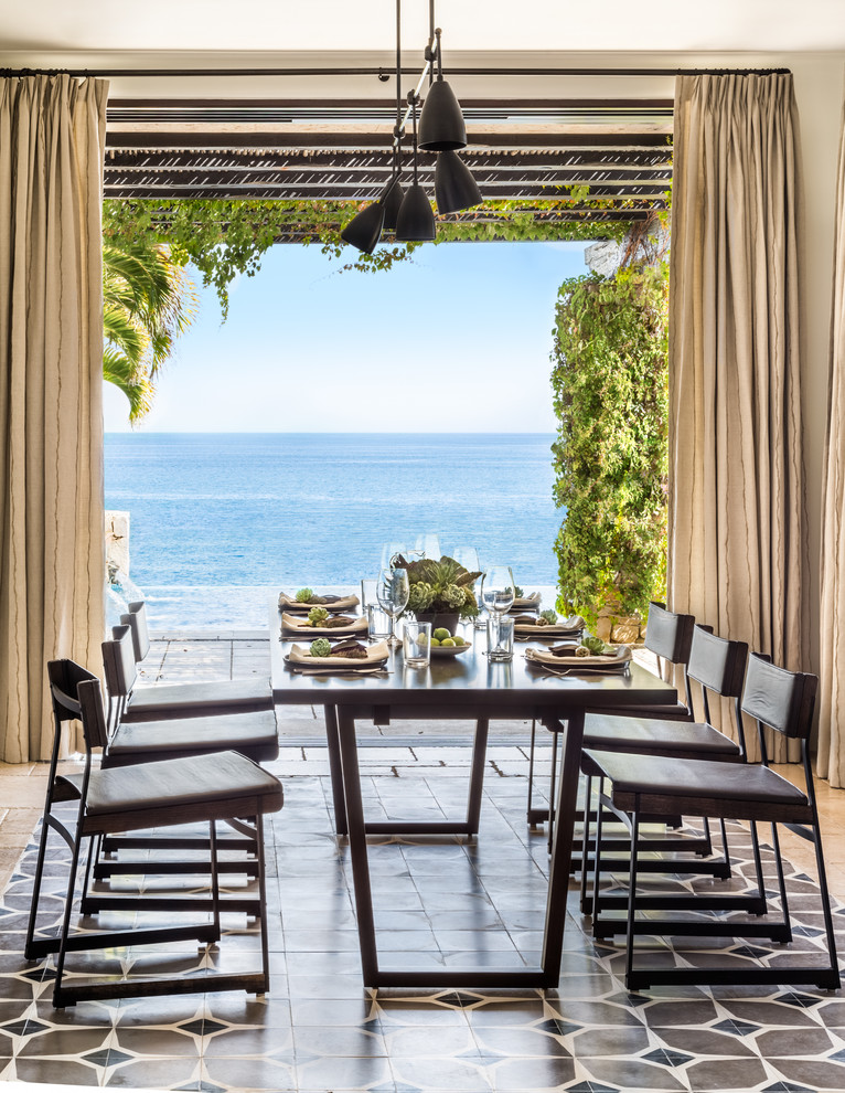 Inspiration for a mediterranean dining room remodel in San Francisco with beige walls