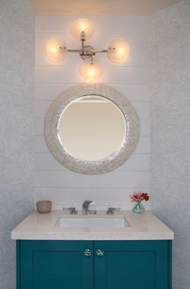 Design ideas for a small nautical cloakroom in Orange County with shaker cabinets, green cabinets, a one-piece toilet, white walls, mosaic tile flooring, a submerged sink, engineered stone worktops, green floors, white worktops, a built in vanity unit and wallpapered walls.