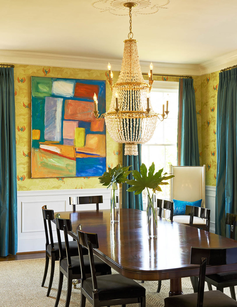 This is an example of a large traditional separate dining room in Charlotte with multi-coloured walls.