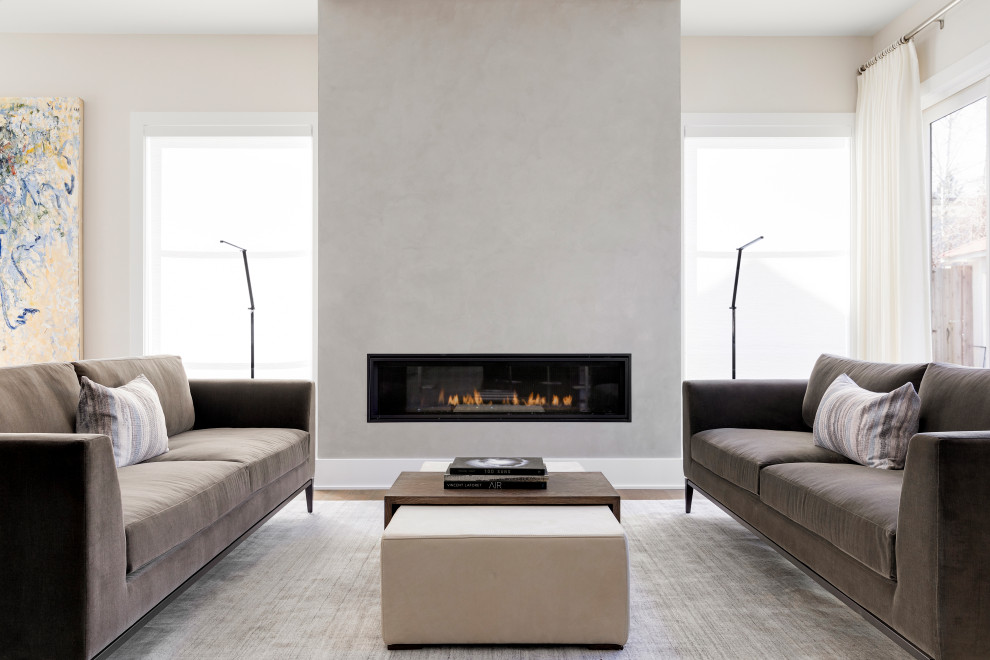 Photo of a contemporary formal living room in Minneapolis with beige walls, a ribbon fireplace and no tv.