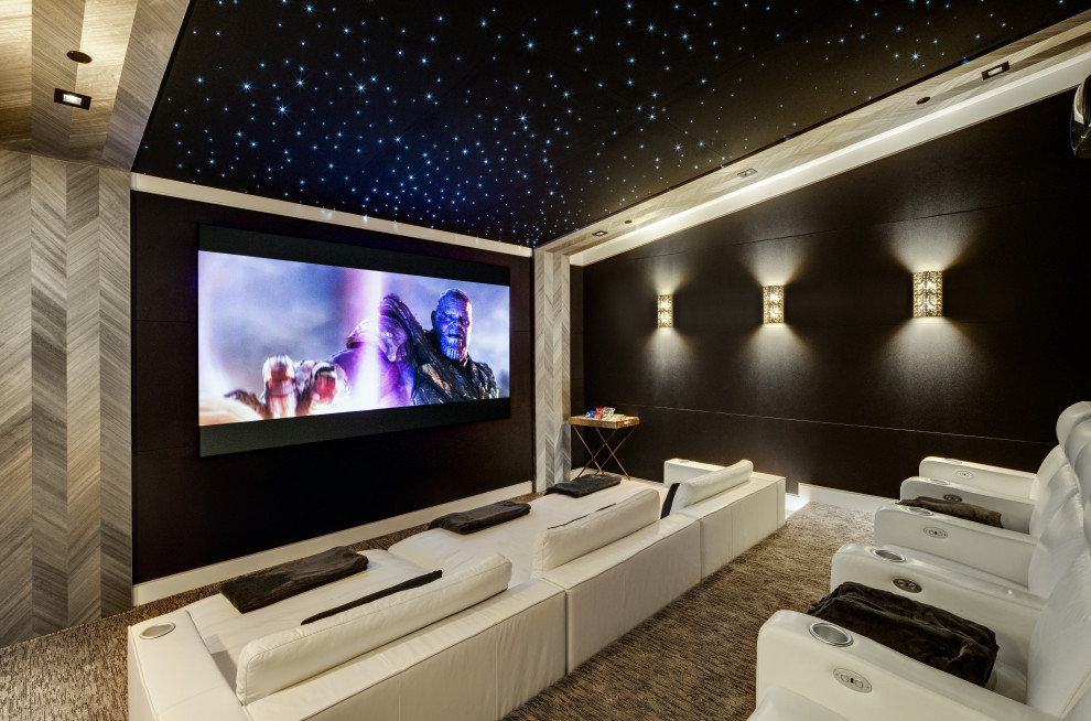 Photo of a contemporary home cinema in Orange County with feature lighting.