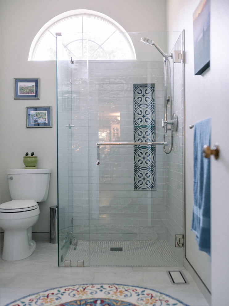 Inspiration for a mid-sized traditional 3/4 bathroom in Portland with furniture-like cabinets, medium wood cabinets, a curbless shower, a two-piece toilet, white tile, porcelain tile, white walls, porcelain floors, an integrated sink, beige floor, a hinged shower door, white benchtops, a single vanity and a freestanding vanity.