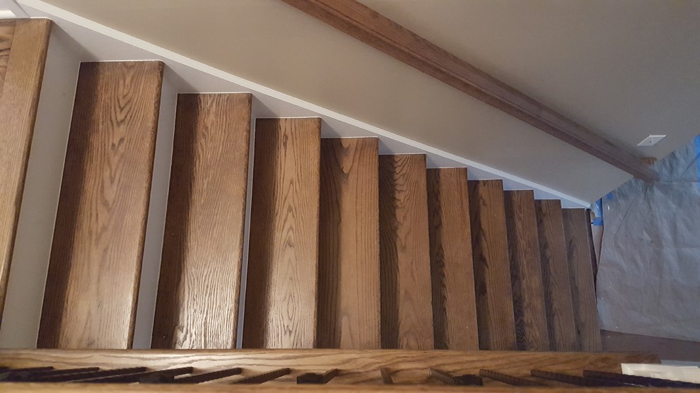 3 and 1/4 red oak select and better special walnut stain , satin water base fini