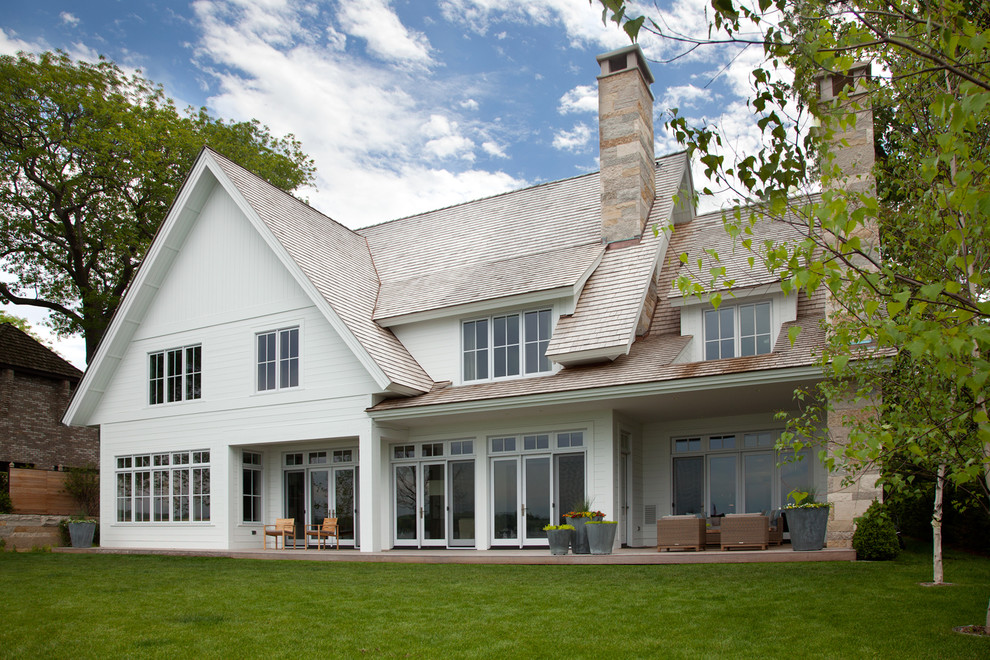 Photo of a transitional two-storey white exterior in Minneapolis.
