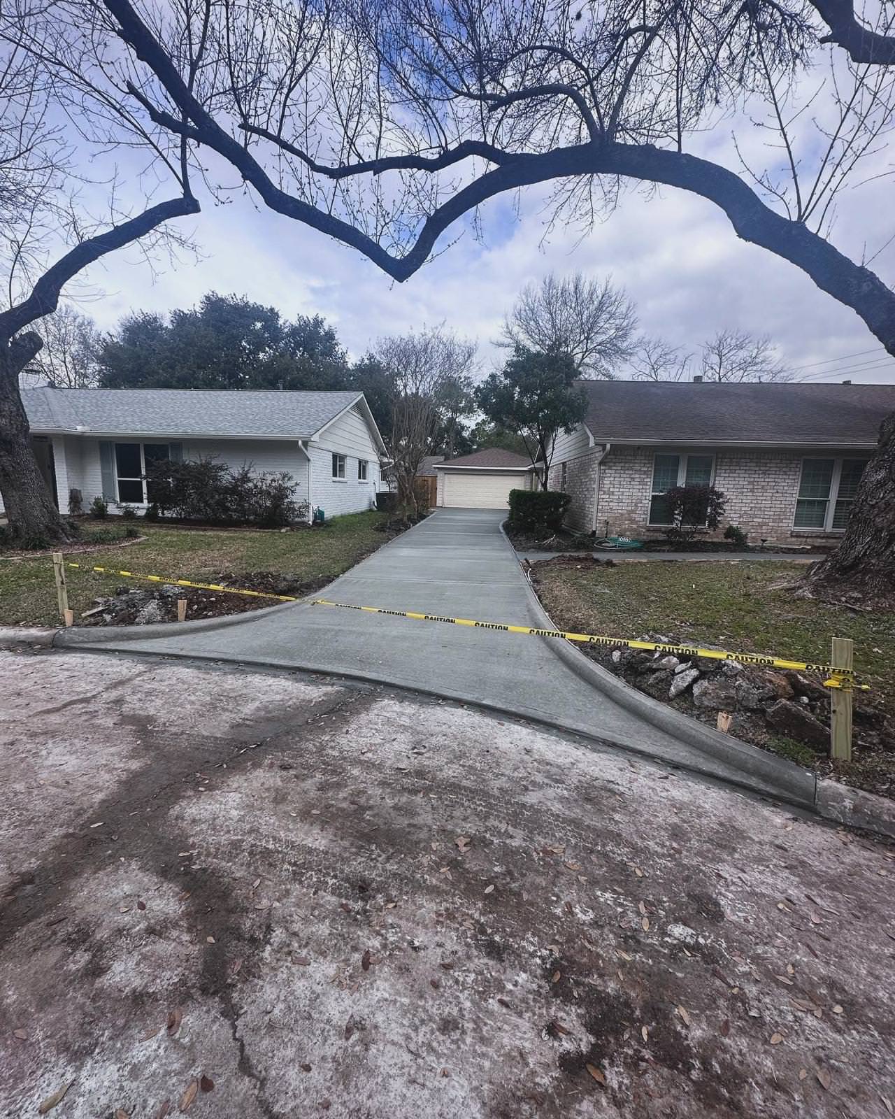 New driveway with sidewalks and stamped concrete!
