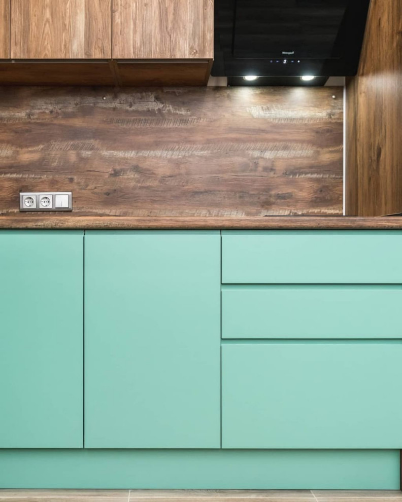 Inspiration for a small scandi l-shaped open plan kitchen in Moscow with a built-in sink, flat-panel cabinets, turquoise cabinets, wood worktops, brown splashback, wood splashback, black appliances, lino flooring, no island, brown floors and brown worktops.