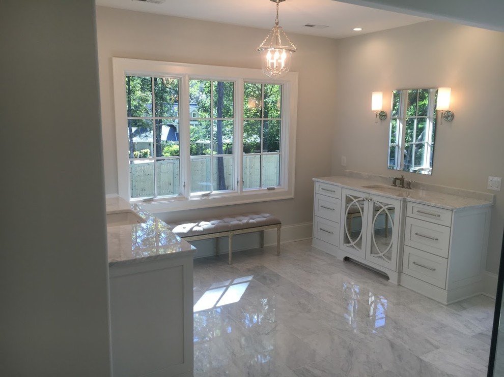 Mid-sized transitional master bathroom in Atlanta with shaker cabinets, grey cabinets, a two-piece toilet, gray tile, marble, grey walls, marble floors, an undermount sink, marble benchtops, white floor, a hinged shower door and a double shower.
