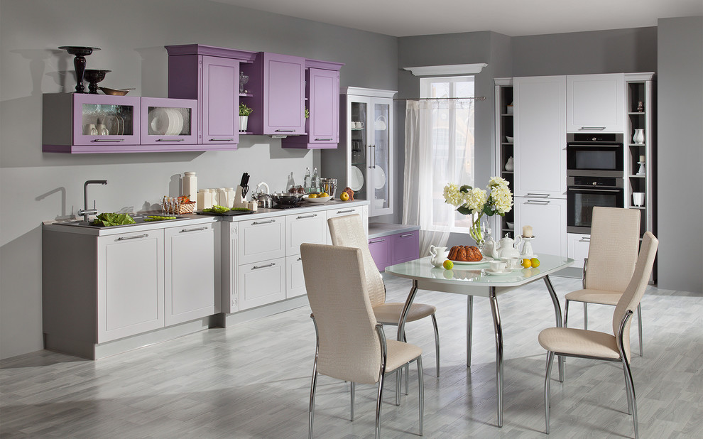 This is an example of a large transitional galley eat-in kitchen in Moscow with an undermount sink, recessed-panel cabinets, purple cabinets, laminate benchtops, light hardwood floors, no island and stainless steel appliances.