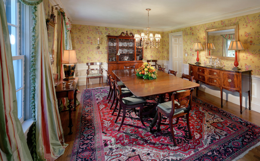 Photo of a traditional separate dining room in New York with medium hardwood floors.