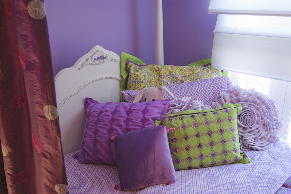 This is an example of a large eclectic kids' bedroom for kids 4-10 years old and girls in Charlotte with purple walls and carpet.
