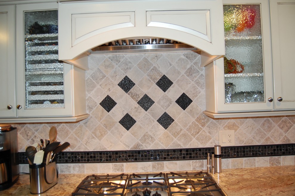 Open concept kitchen - mid-sized transitional u-shaped medium tone wood floor open concept kitchen idea in Chicago with an undermount sink, flat-panel cabinets, dark wood cabinets, granite countertops, beige backsplash, stone tile backsplash, stainless steel appliances and a peninsula