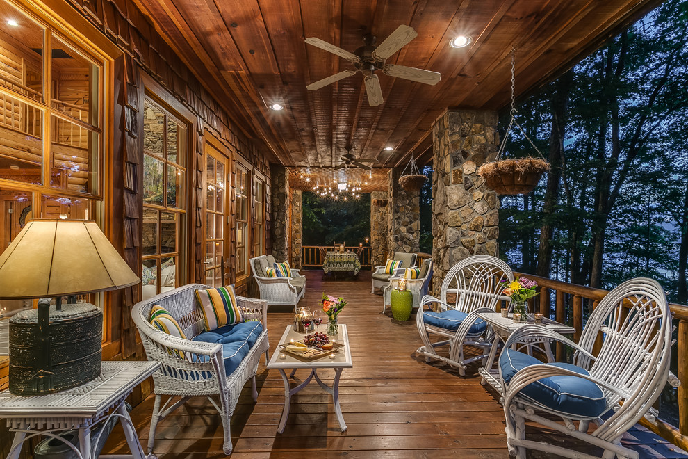 Photo of a country deck in Atlanta with a roof extension.