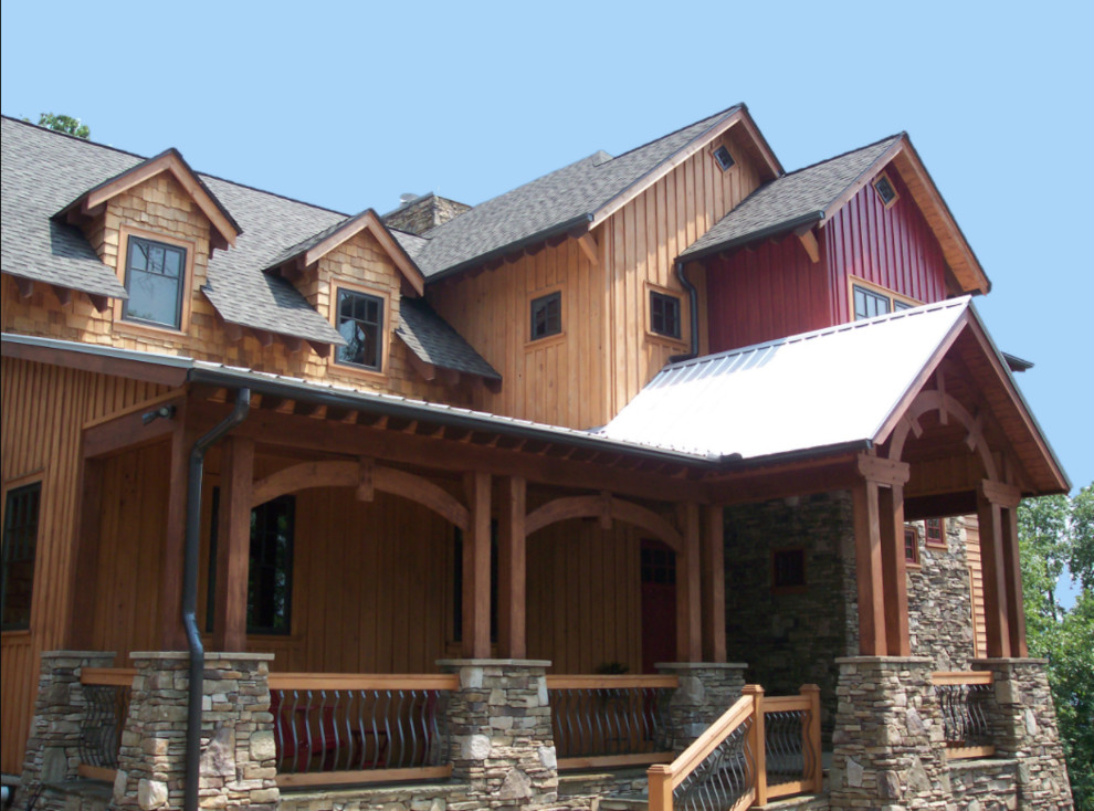 Example of a mid-sized mountain style brown two-story wood gable roof design with a shingle roof
