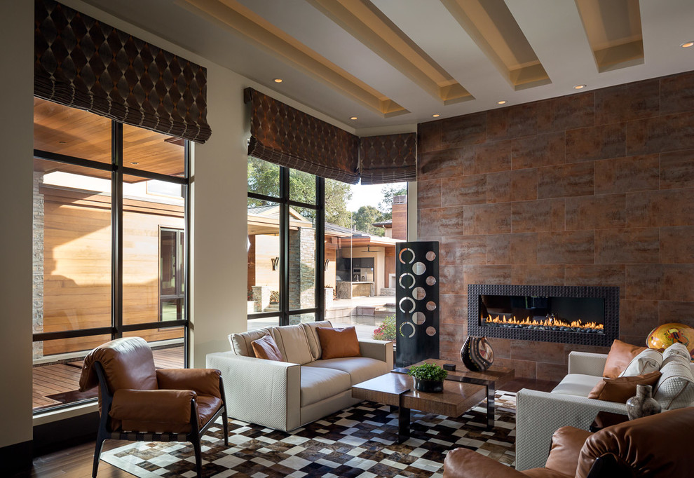 Design ideas for a large contemporary formal open concept living room in San Francisco with beige walls, bamboo floors, a ribbon fireplace, a tile fireplace surround and no tv.