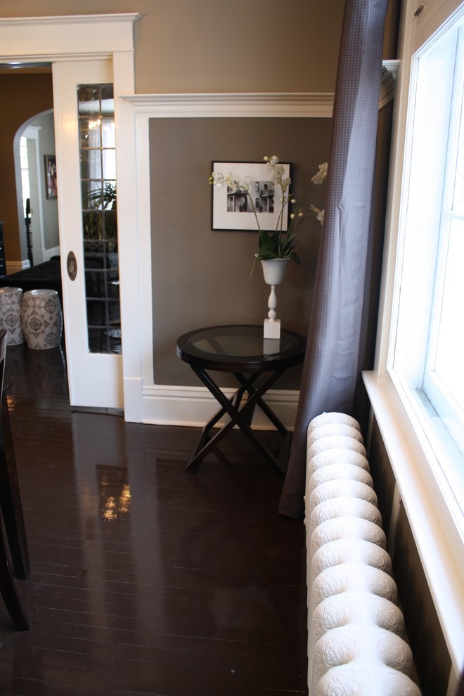 Mid-sized transitional separate dining room in Other with grey walls and dark hardwood floors.