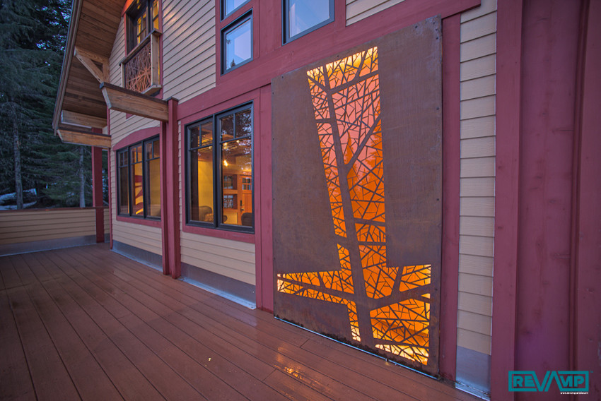 Photo of a mid-sized eclectic three-storey yellow exterior in Seattle with concrete fiberboard siding.