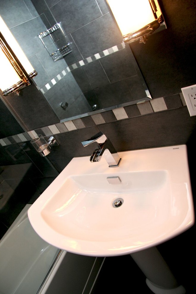 Mid-sized transitional 3/4 porcelain tile bathroom photo with a pedestal sink