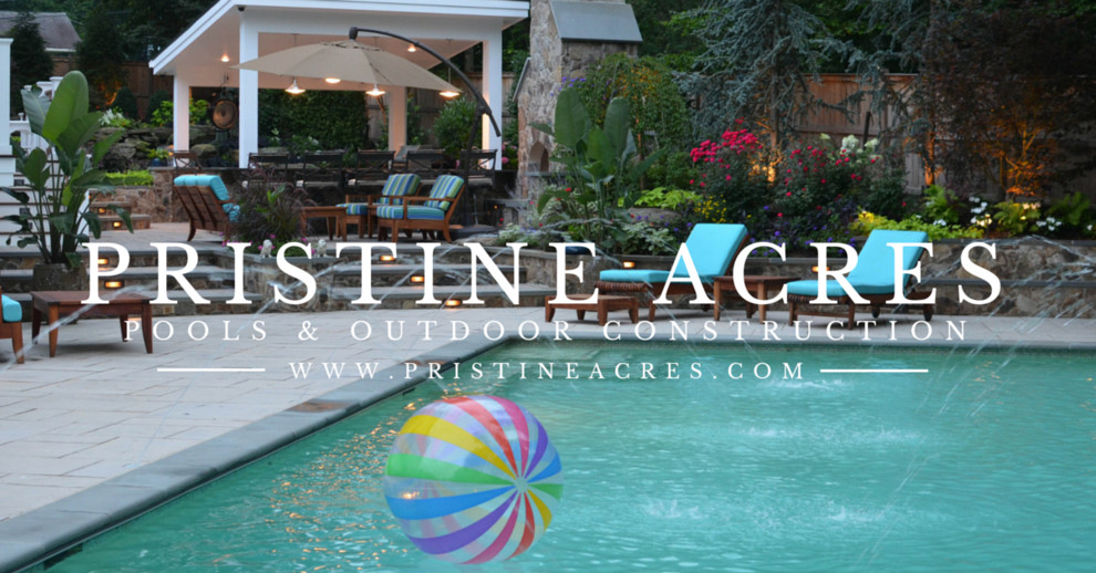 Example of a huge transitional backyard concrete paver and rectangular lap pool fountain design in DC Metro