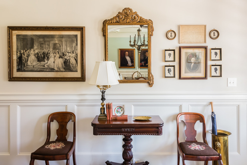 Traditional entryway in Raleigh with white walls.