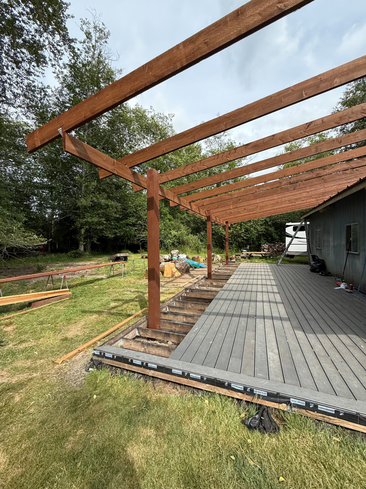 Deck - rustic deck idea in Seattle