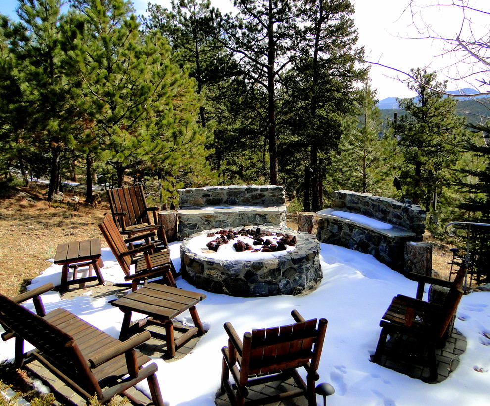Inspiration for a country patio in Denver with a fire feature and no cover.