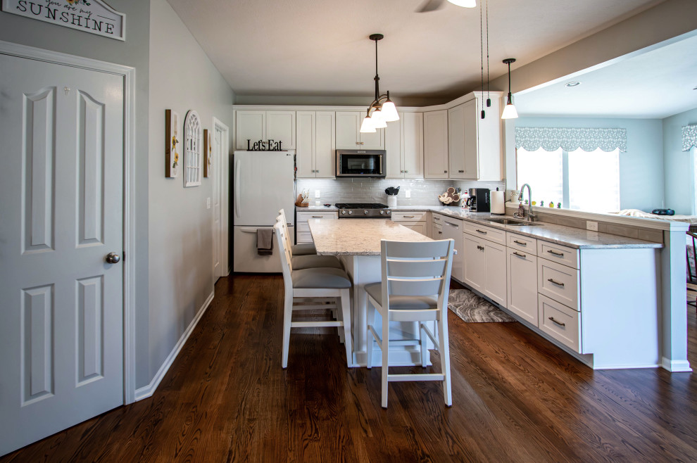 White Shaker Kitchen w/ Pietra Quartz Countertops & Gray Subway Tile ...