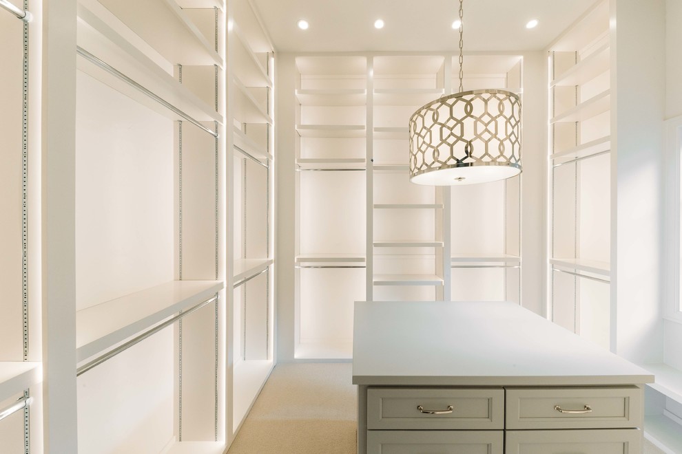 Example of a large transitional closet design in Austin