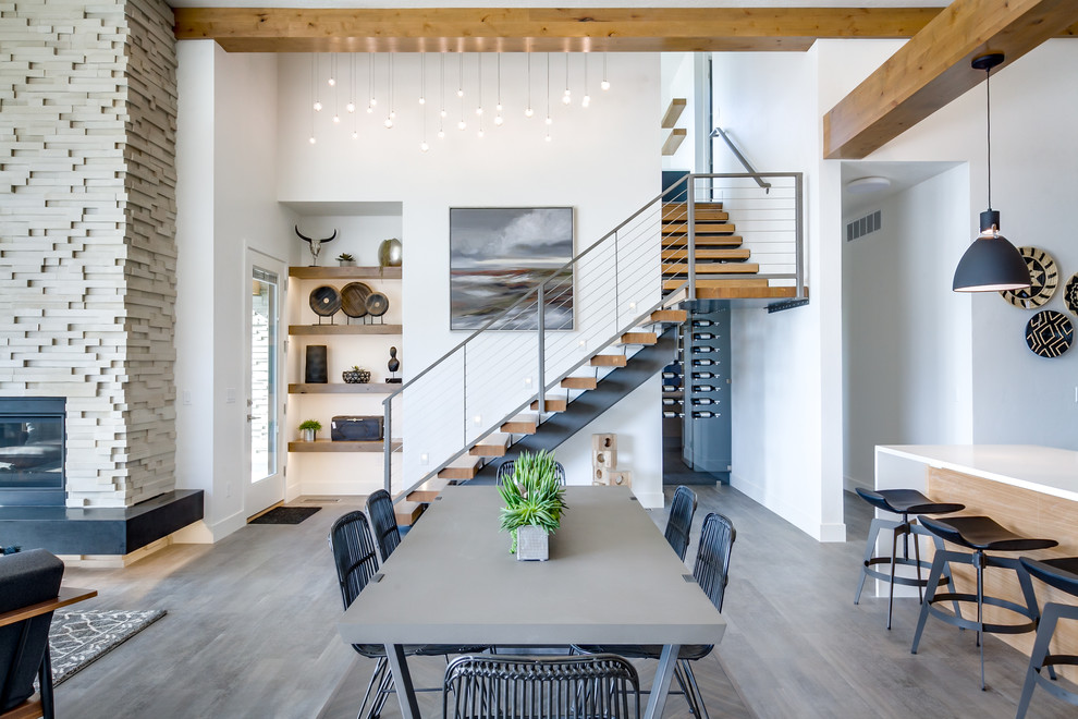 Design ideas for a contemporary open plan dining in Boise with white walls and dark hardwood floors.
