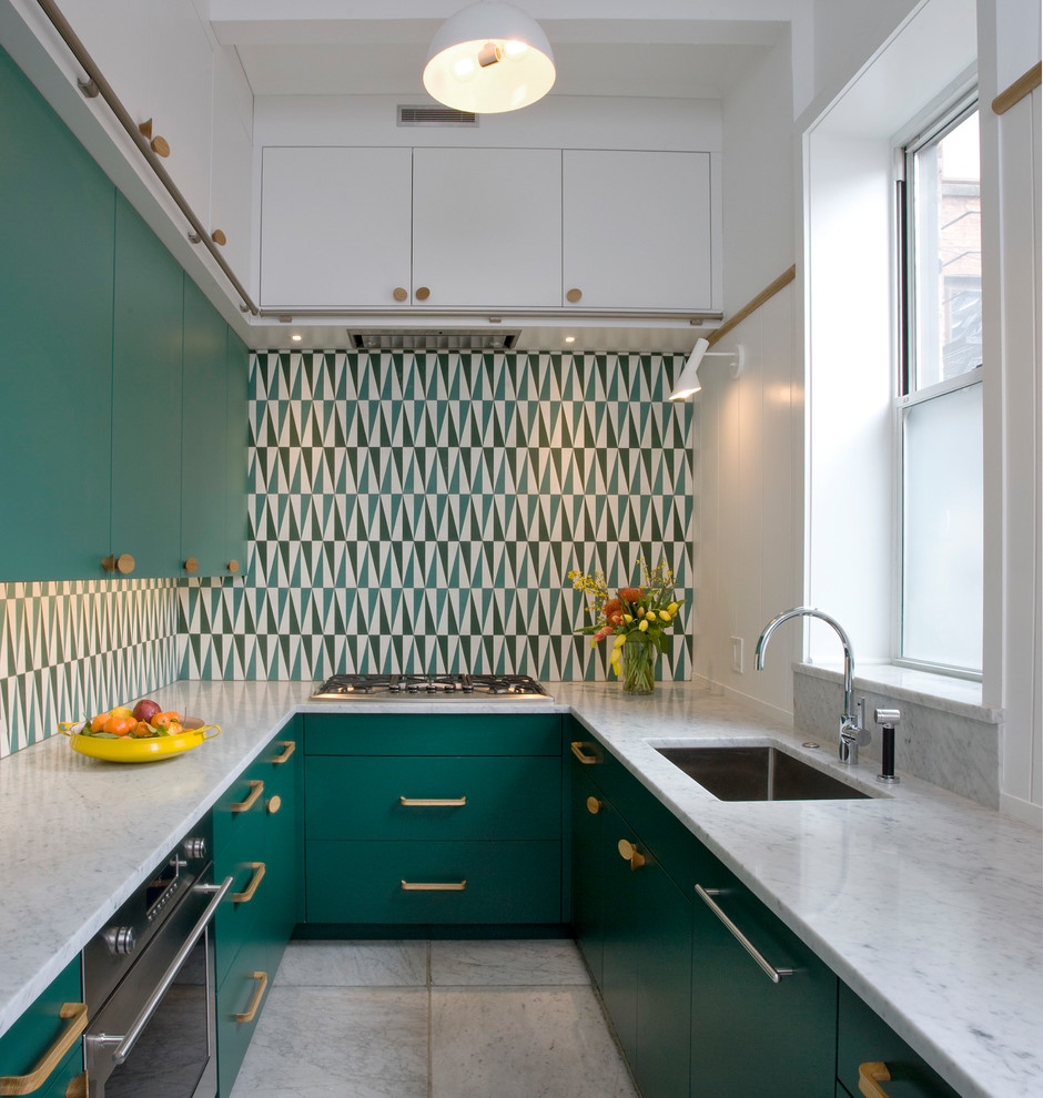 Small contemporary galley separate kitchen in Chicago with an undermount sink, flat-panel cabinets, green cabinets, marble benchtops, multi-coloured splashback, cement tile splashback, marble floors, no island, white floor, white benchtop and panelled appliances.