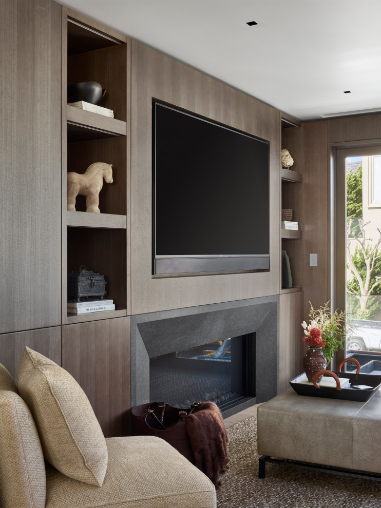 Example of a huge minimalist open concept light wood floor and beige floor family room library design in San Francisco with a media wall, white walls, a standard fireplace and a plaster fireplace