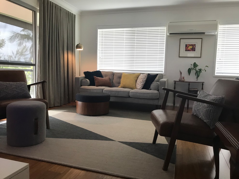 Midcentury living room in Brisbane with bamboo floors.