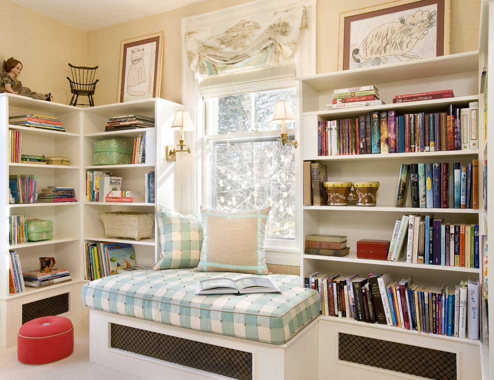 Photo of an eclectic gender-neutral kids' study room in Boston with beige walls and carpet.