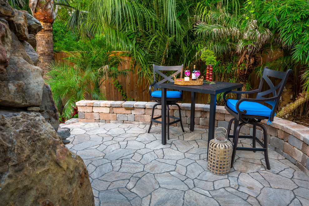 Design ideas for a tropical patio in Jacksonville.