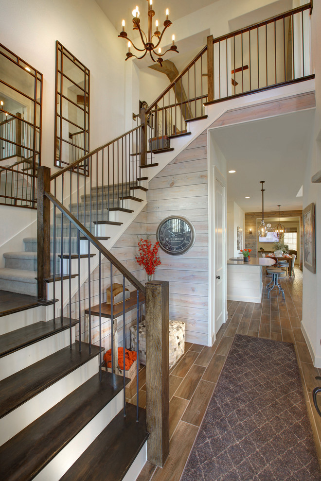 This is an example of a mid-sized country entry hall in Dallas with ceramic floors and beige walls.