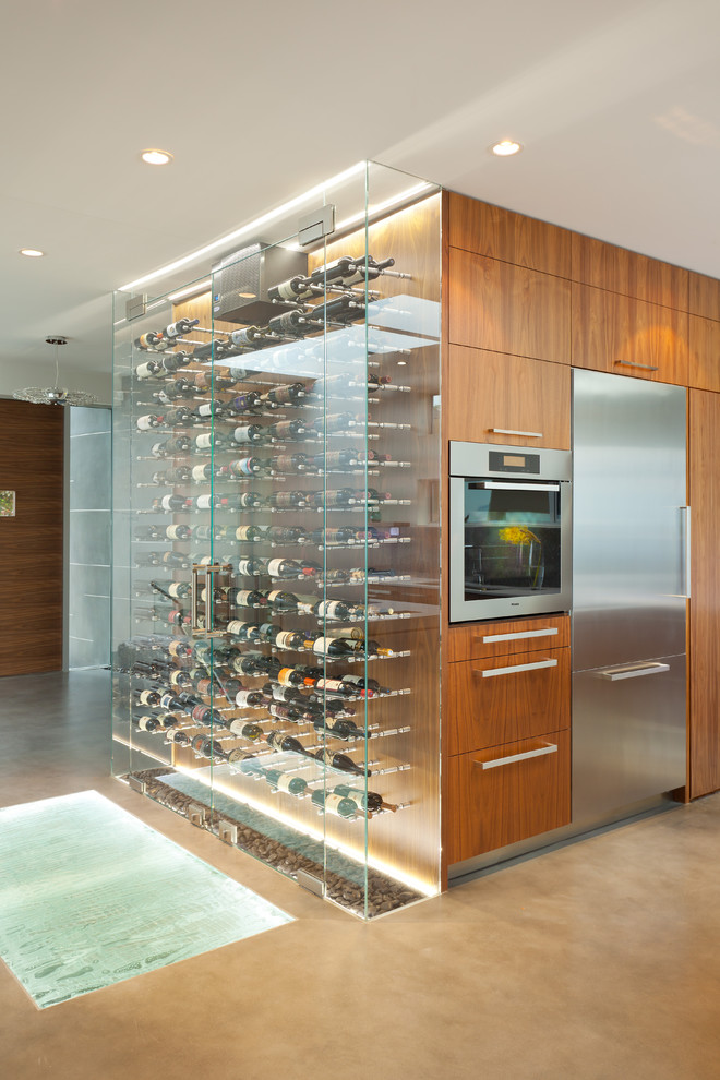 Inspiration for a modern wine cellar in Vancouver with beige floor.
