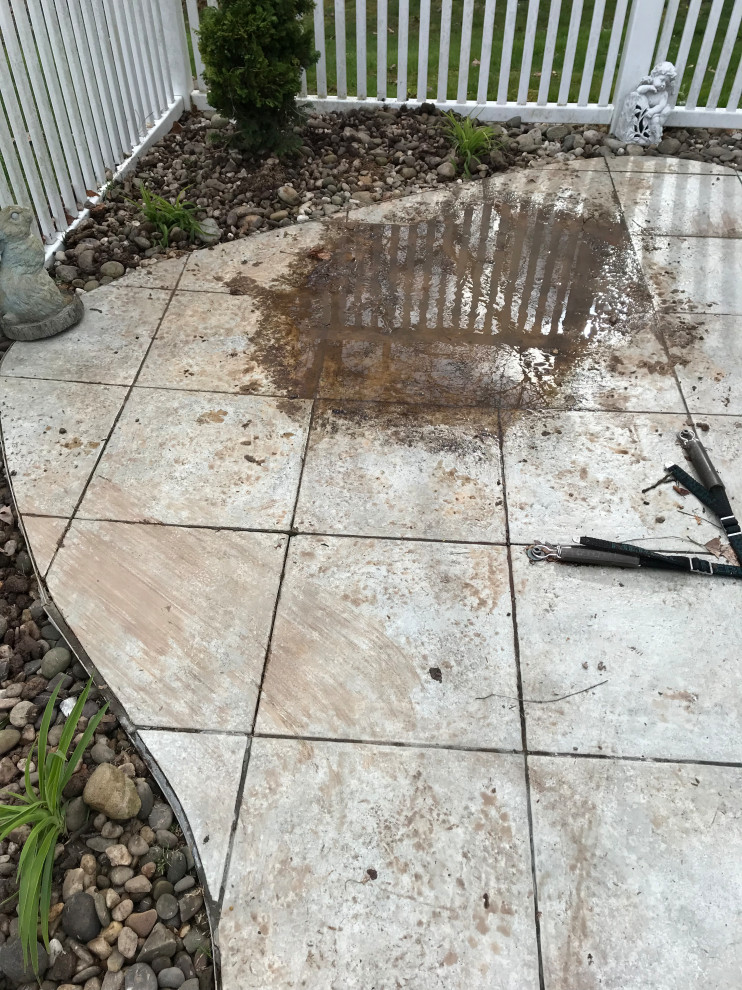 Inspiration for a mid-sized transitional concrete paver pool remodel
