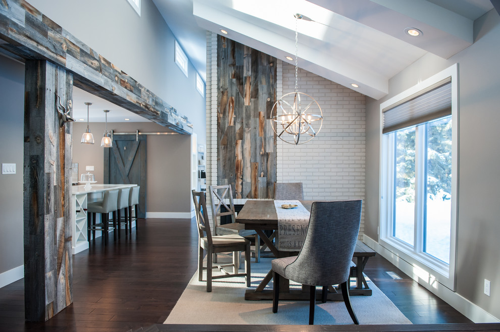 Example of a mountain style home design design in Calgary