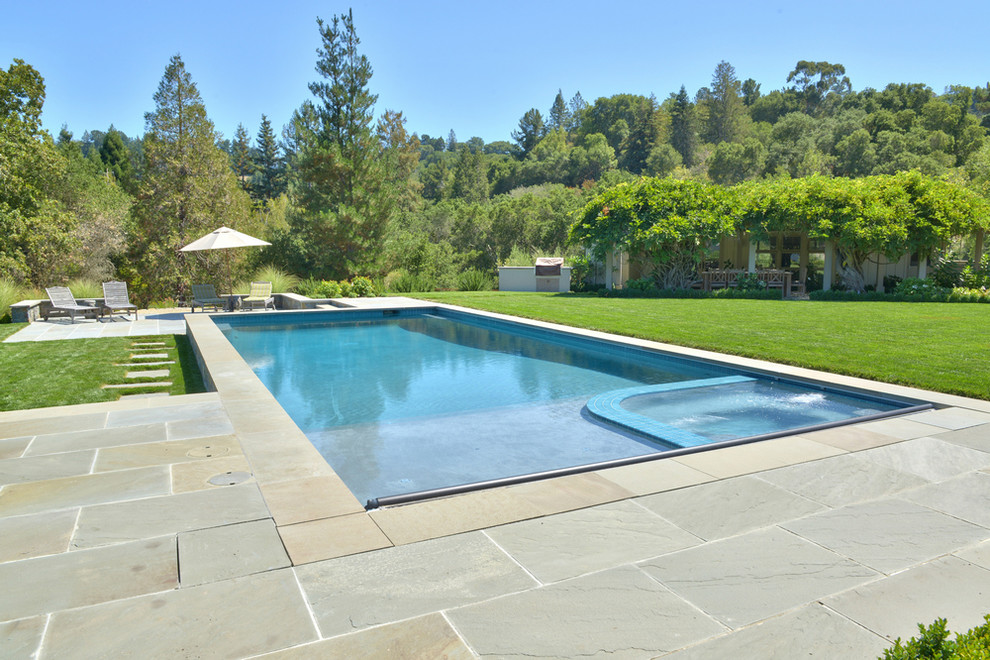 Design ideas for a large arts and crafts backyard rectangular lap pool in San Francisco with a hot tub and concrete pavers.