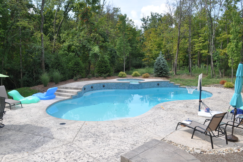 Photo of a traditional pool in Cincinnati.