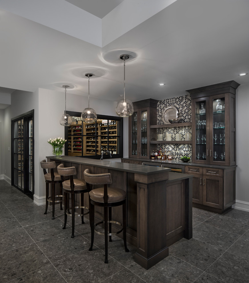Photo of an expansive transitional home bar in Detroit.