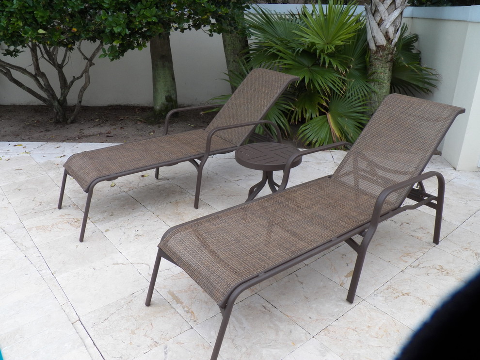 Beach style home design photo in Miami
