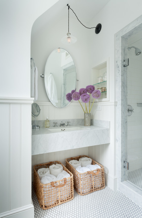 Brooklyn Townhouse - Small transitional corner shower photo in New York with marble countertops, an undermount sink and white walls