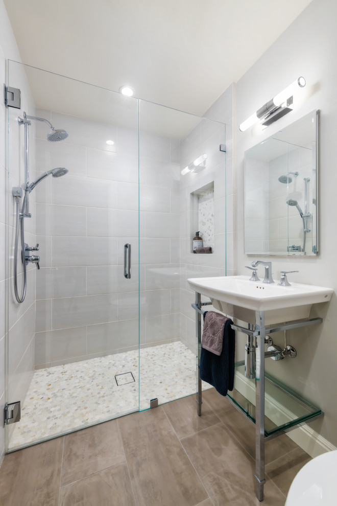 Design ideas for a small transitional 3/4 bathroom in San Francisco with a curbless shower, a one-piece toilet, beige tile, porcelain tile, grey walls, porcelain floors, grey floor, a hinged shower door and a console sink.
