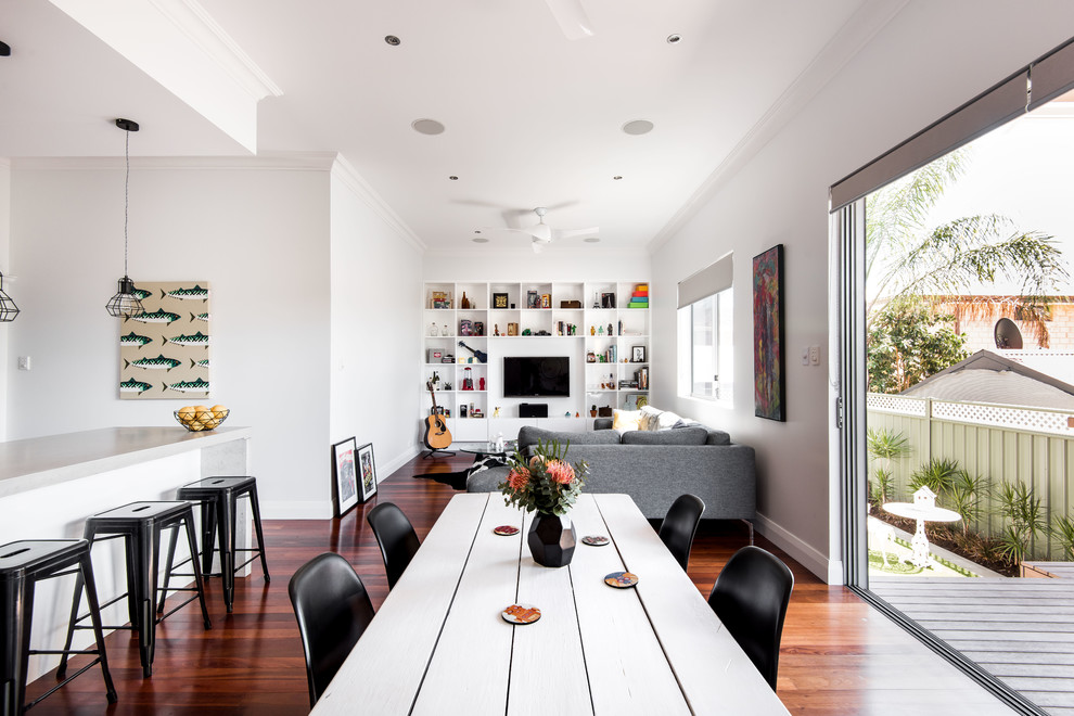 Photo of a contemporary dining room in Perth with white walls, dark hardwood floors and no fireplace.