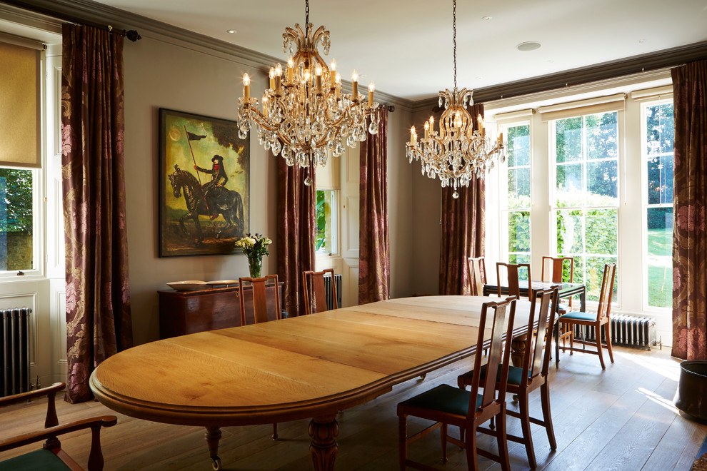 This is an example of a large traditional separate dining room in West Midlands with grey walls.